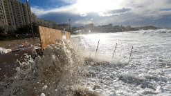 Photograph of the Wave ImPact (WIP) measuring station deployed during an energetic winter storm event at the field site if the Grande Plage of Biarritz.